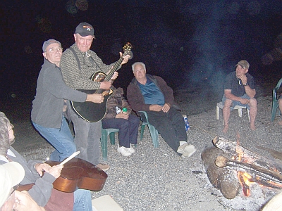 beach firesinging and playing