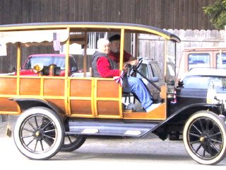 Dave and Kittie Baxter taking a cruise in
        Depot Hack,Aunt Maude