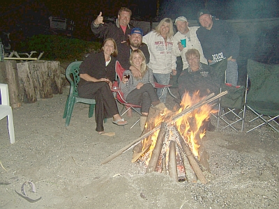 Guests enjoyinga beach fire