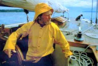 David Baxter sailing the Lieber Schwan
        with his trusty little boat-nik CoCo.